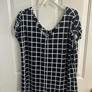 C. Black and White Boxy Blouse with Grid Pattern